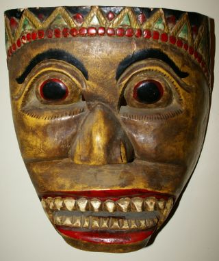Large Painted Wood Mask Of A Male Figure From Indonesia photo