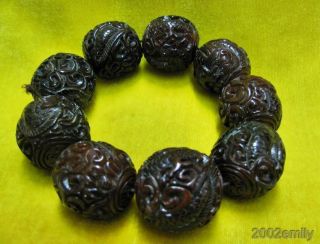 Chinese Oxhorn Carved Beads For Bracelet - Nine Dragon Playing Ball photo