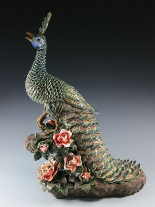 A Stunning Chinese Porcelain Statue Peacock photo