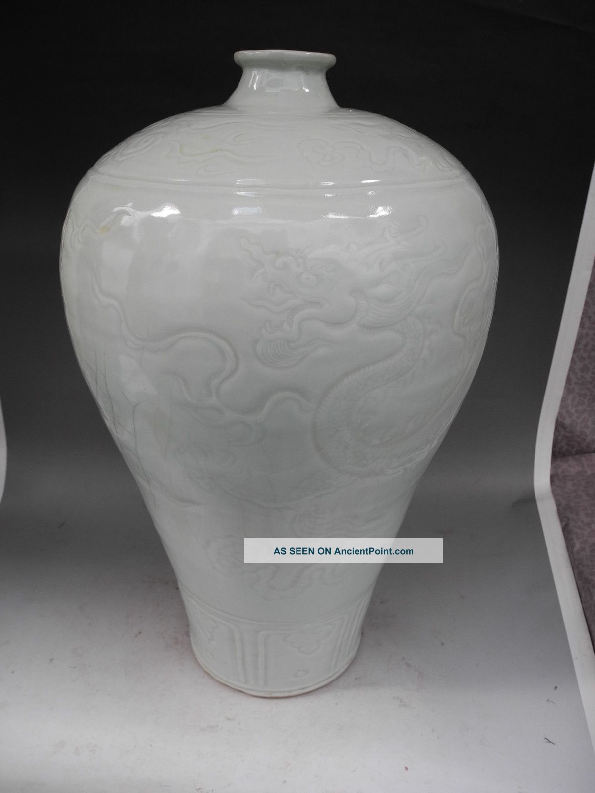 Chinese White Glaze Carved Dragons Porcelain Vase Vases photo