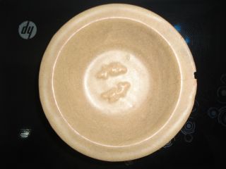 Ancient Chinese Celadon Bowl With Twin Fish photo