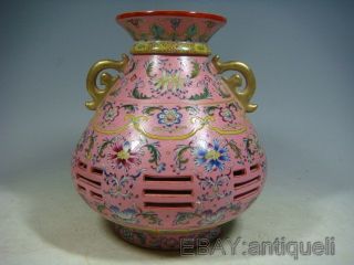 Famille Rose Porcelain Revolve And Hollow Gilded Vase photo