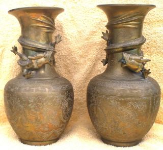 Pair Of Antique Simmetric Bronze Dragon Vases photo