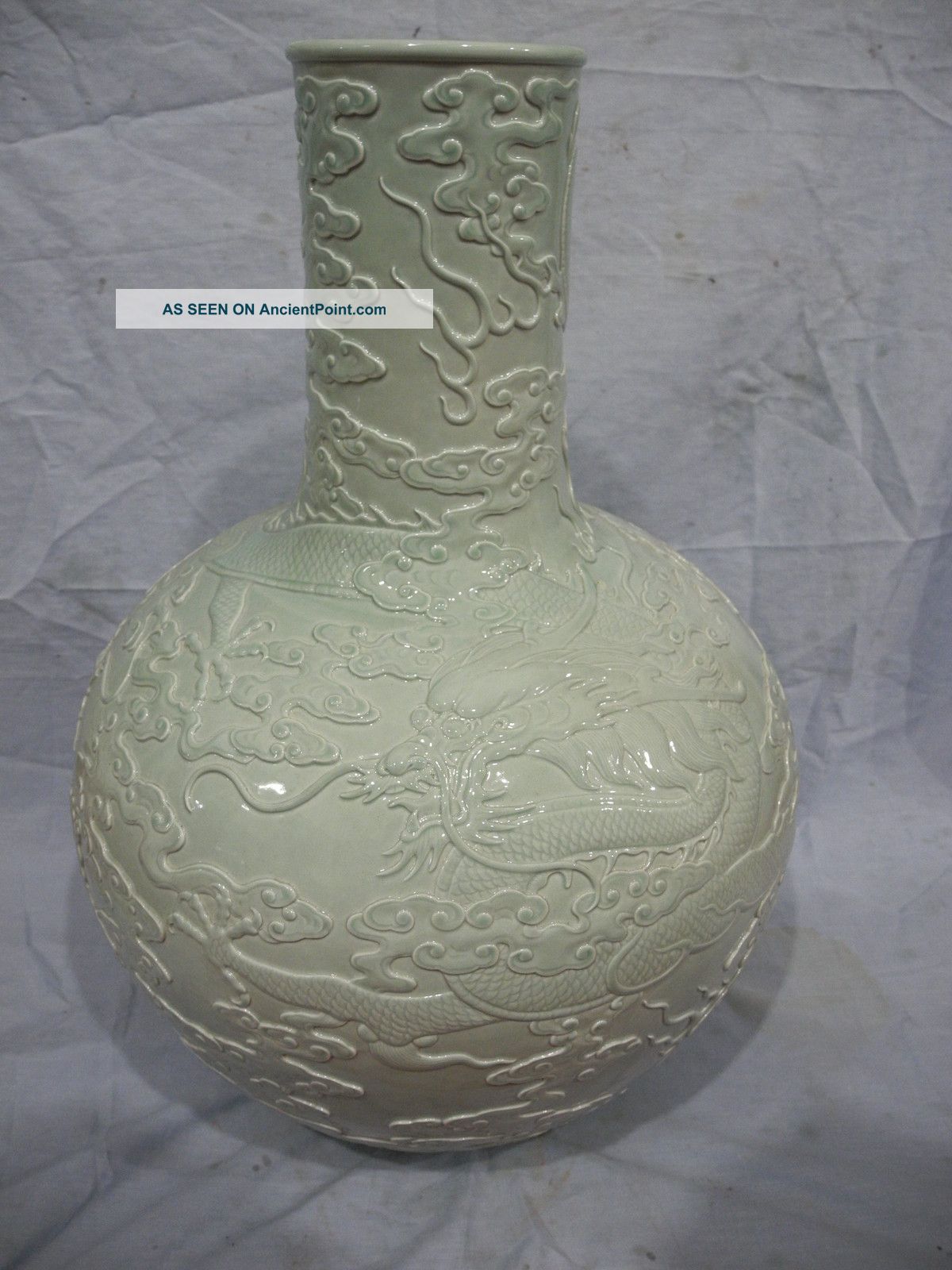 Chinese Monochrome Glaze Carved Dragons Porcelain Tianqiu Vase Mark Vases photo