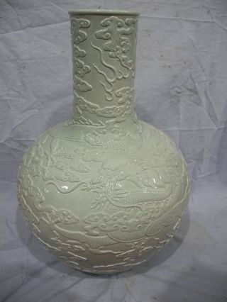 Chinese Monochrome Glaze Carved Dragons Porcelain Tianqiu Vase Mark photo