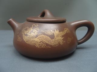 The Small Size Of The Gilt Dragon Teapot photo