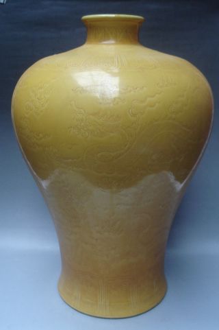 Yellow Carved Five Dragons Porcelain Vase photo