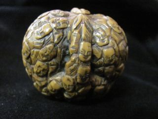 Vintage Netsuke Walnut Smiling Men photo