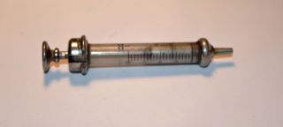 A Medical Collectable Vintage C1940‘s Record Glass & Metal Hyperdermic Syringe photo