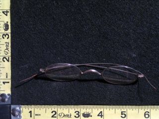 Vintage Metal Rim Eyeglasses / Spectacles With An O On The Nose Piece photo