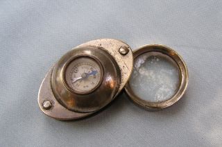 Antique Magnifier And Compass photo