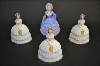 A Crown Staffordshire Crinoline Lady China Bell,  With Three Others photo
