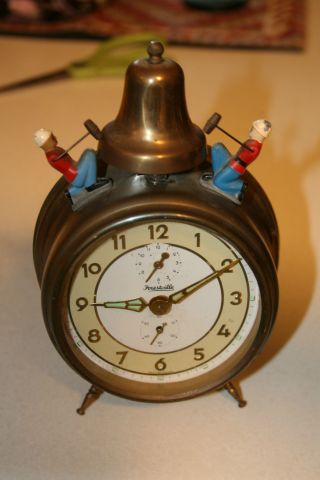 Vintage Forestville Alarm Clock With Bell Strikes photo