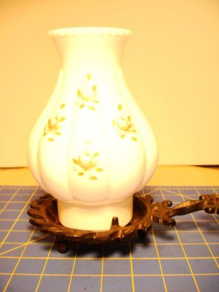 Vintage Ornate Cast Iron Candle Holder With Floral Globe photo