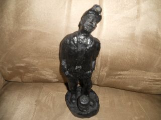 Very Old Hand Carved Coal Miner photo