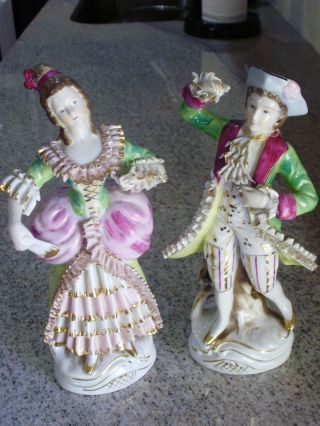 Lovely Lace Porcelain Couple With Gold Detail photo