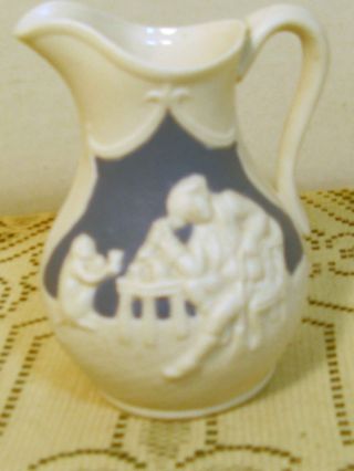 Antique Parianware Cream Pitcher With A Monkey photo