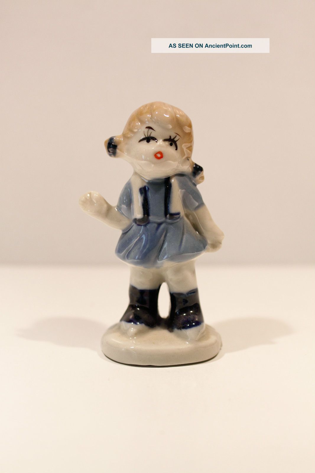 Porcelain Girl,  Waving Figurines photo