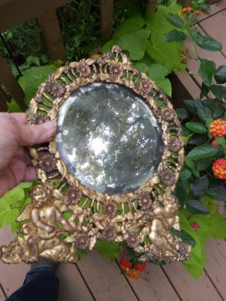Antique Fancy Brass Shaving Mirror With Cupids photo