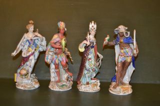 4 Capodimonte Continents Porcelain Figurines photo