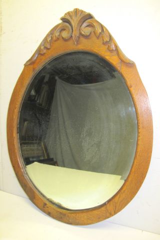 Handsome Antique Carved Crown Wood Back Beveled Oak Mirror photo