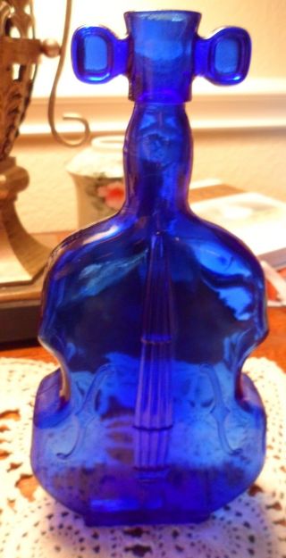Antique/vintage Cobalt Blue Glass Violin Shaped Bottle photo