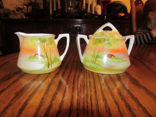 Antique Nippon Hand Painted Creamer And Sugar Bowl photo