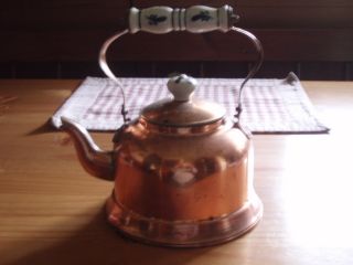 Vintage Copper Tea Kettle With Porcelain Handle photo