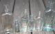 7 Antique Vintage Old Clear Green Blue Glass Cork Top Embossed Bottles Bottles photo 1