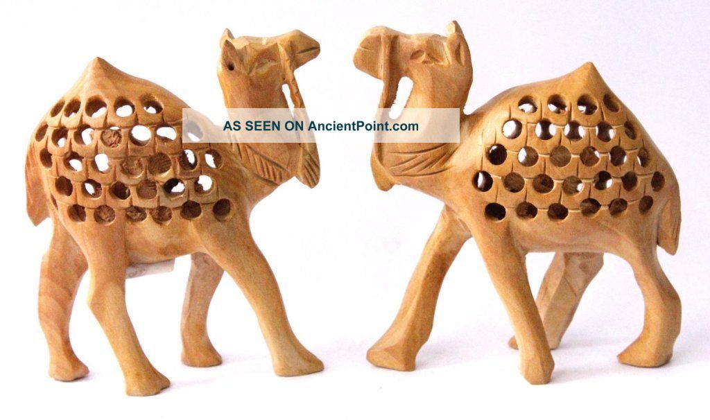 A Set Of 2 Hand Carved Indian Royal Camel Wood Jali Statue Sculptures With Baby ' Carved Figures photo