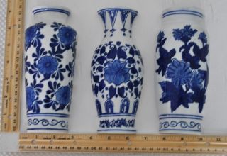 - Set Of Three Blue Wall Vases photo