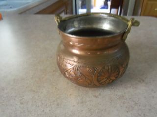 Antique Copper Pot With Engraving And Hammered Bottom photo