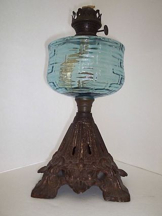 Vintage Oil Lamp Light Blue Glass Font photo