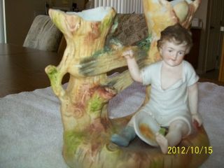 Ceramic Boy Figure Vase photo