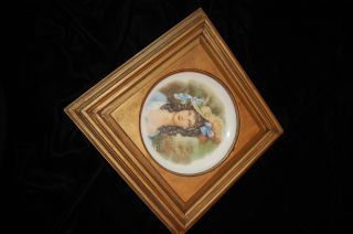 Vintage Wall Frame With Painted Plate. photo