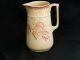 Antique Pottery Pitcher With Bird,  Butterfly,  And Plant Design Pitchers photo 1
