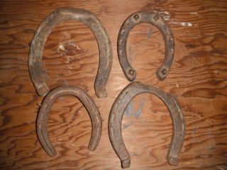 4x Real Old Rusty Horseshoes photo