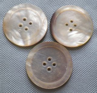 3 Antique Mother Of Pearl Buttons Carved Circles Large Spots Of Smoke 4 Holes photo