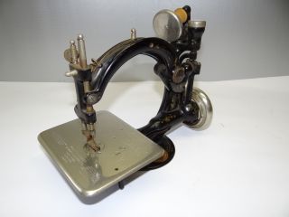 Antique Old Broken Metal Wilcox & Gibbs 1894 Table Top Miniature Sewing Machine photo