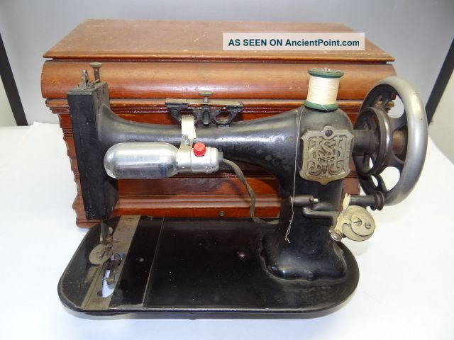 Antique Old Cast Iron Household Institute Broken Sewing Machine With Wooden Case Sewing Machines photo