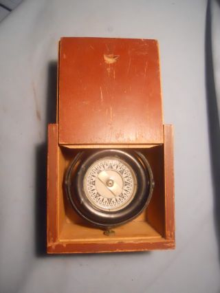 In Old Wood Box. . .  Old 4 Way Maritime Boat Compass. . .  Works Good. .  Floating. .  Heavy photo