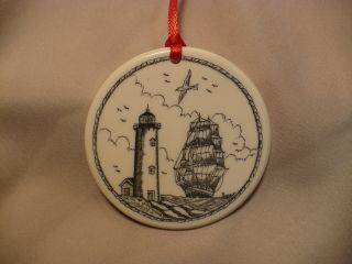 Scrimshaw Resin Christmas Ornament Ship/ Lighthouse photo