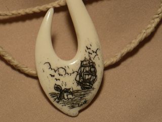 Scrimshaw Ox Bone Maori Pendant Ship & Whale Tail photo