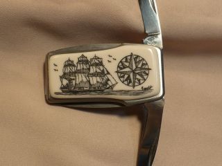 Scrimshaw Resin Money Clip Knife Side Ship - Compass Rose photo