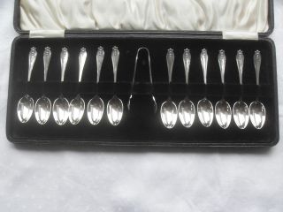 A Boxed Set Of 12 Solid Silver Teaspoons With Tongs London1929 147gm photo