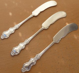 3 Rogers Silverplate Butter Spreaders,  Flemish,  1894, photo