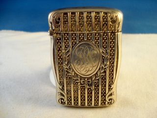 Fancy Antique F.  S.  Gilbert Sterling Silver Matchsafe,  Raised Decoration photo
