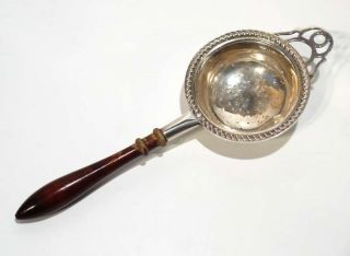 Vintage / Antique Silver Plated Tea Strainer With Turned Wood Handle. photo