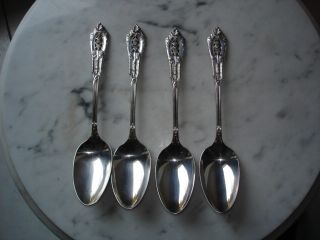 Four Wallace Sterling Rosepoint Seven Inch Spoons - photo