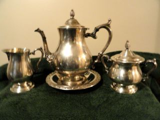 Silverplated Tea Set Pot Creamer Sugar Bowl Tray Circa,  1920 photo
